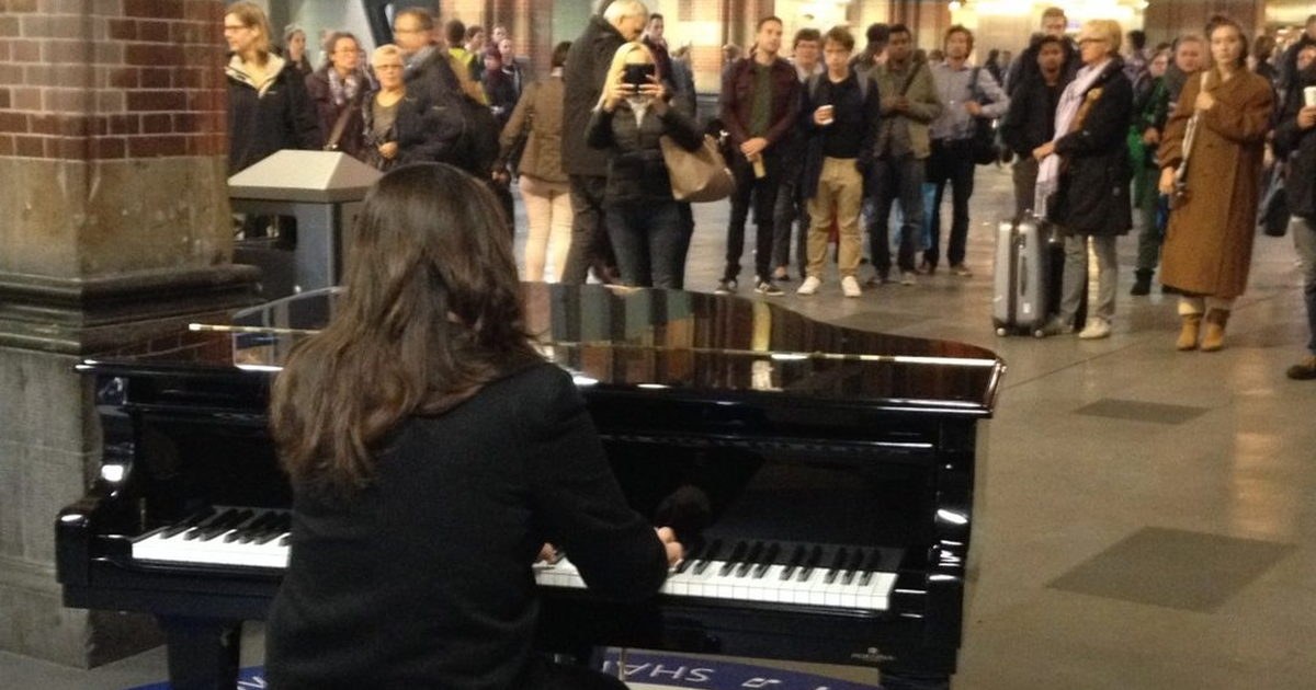Playing Piano at Amsterdam Central: A Morning Local Experience
